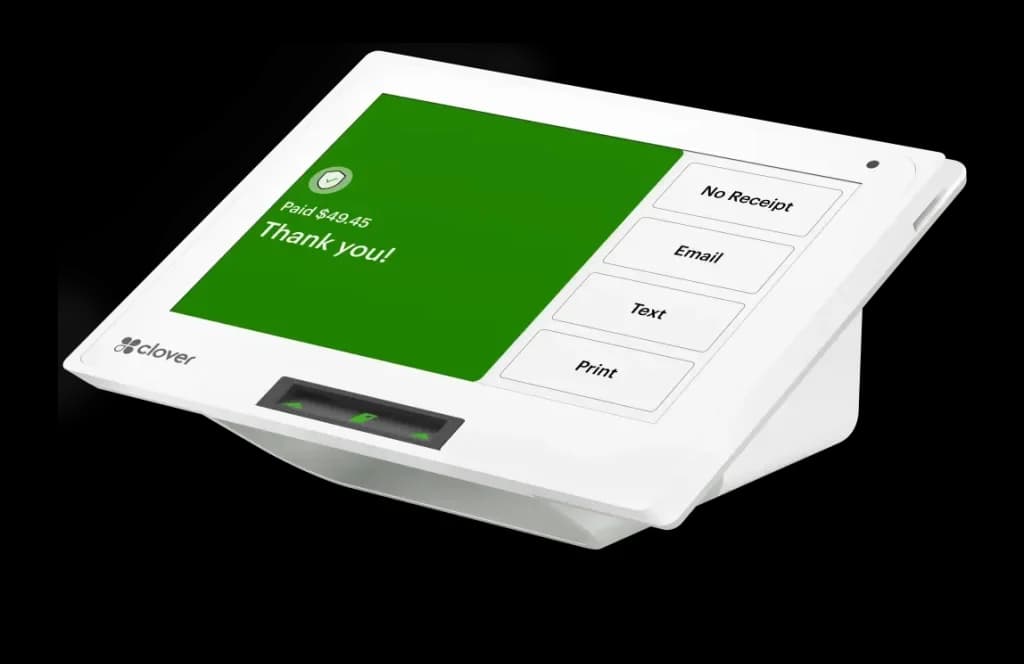 A Clover Mini counter terminal showing a completed sale